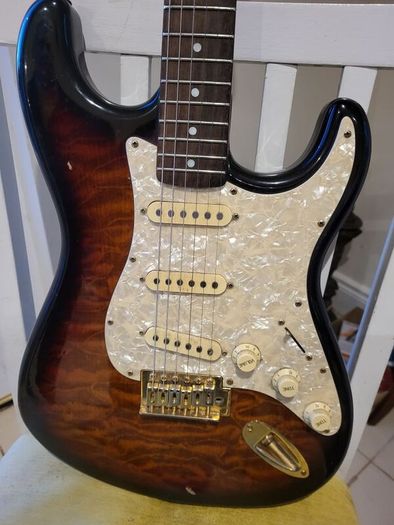 SX quilted sunburst electric guitar