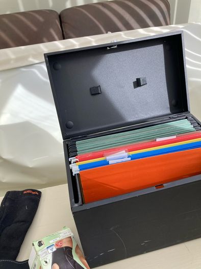 Metal file box , knee supports and window blind could be used to paint on due children or make a banner