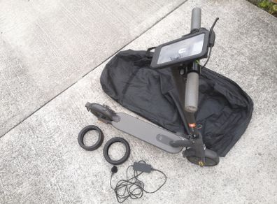 Folding e-scooter with phone holder, carrier bag, extra CST Durable tires & charger