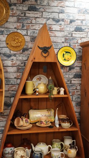 Boat-Shaped Display Shelving Unit