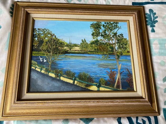 picture oil on board painting. Features a serene scene