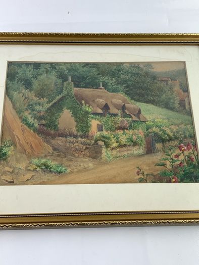 Vintage watercolour of thatched cottage