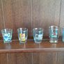 A lot of 6 shot glasses all different Image 2