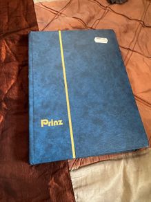 Mint UK album with stamps