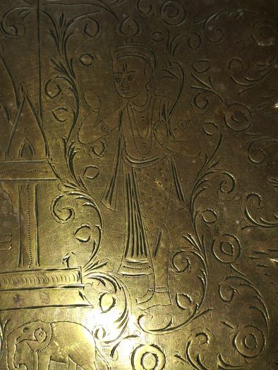 Antique Brass Charger Tray Hand-Engraved Mughal court figures. The Charger has a distinct Scalloped edge and is heavily decorated. Similar items often date from the late 19th century, specifically around the 1870s or 1880s