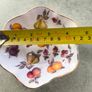 3 different itmes- 1- vintage small ceramic flared vase signed T. Casey 20 .00 euro. 2 - St. George Bone China Trinket small dish/ bowl England 12.00 euro. 3- Miniature Ceramic Praying Hands. 5 inches. White With Pink Flowers On The Base.12.00 euro. Image 9