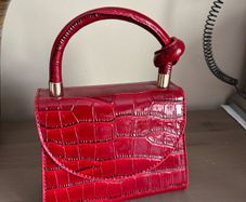 Red handbag with chain