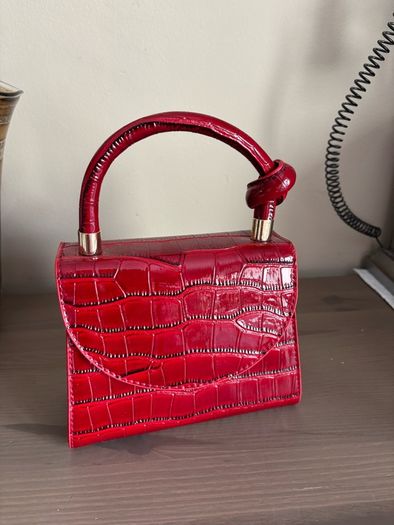 Red handbag with chain