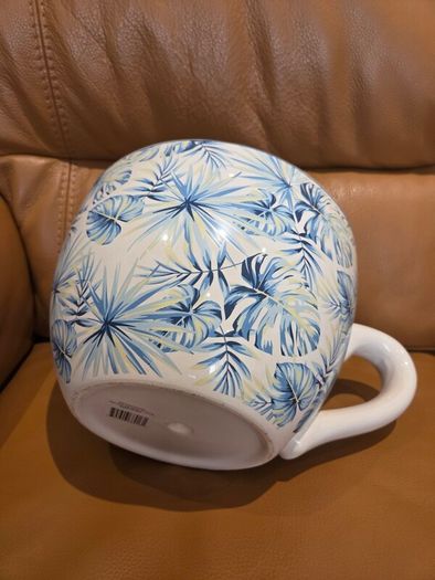 Large cup and saucer pot from Denby