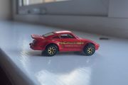 1989 orange Porsche Turbo 930, Hot Wheels metal base,