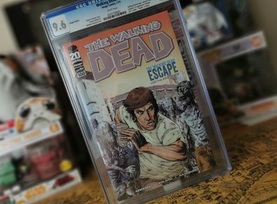 Walking Dead #100 ! CGC Graded ! 9.6 Near Mint + ! Current Value is 432 Dollars ! SDCC 2012 Exclusive Escape Variant Cover ! 1st Appearance of Negan ! Death of Glenn ! by Image Comics !