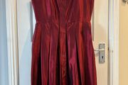 Very good condition Red dress with belt . Size 14