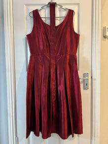 Very good condition Red dress with belt . Size 14
