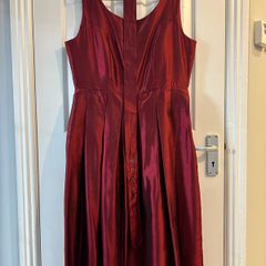 Very good condition Red dress with belt . Size 14