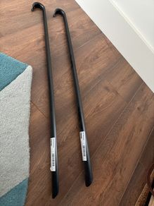 Long black metal shoe horns