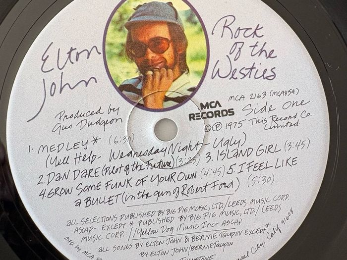 Elton John - Rock of the Westies. Absolutely lovely UK 1st pressing with  printed inner sleeve and insert.