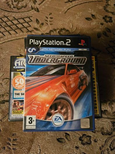 PlayStation 2 with games