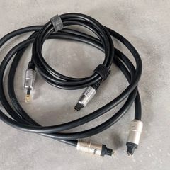 2Toslink cables. 1-Mini-Toslink  to Toslink and 2 standard Toslink both ends.