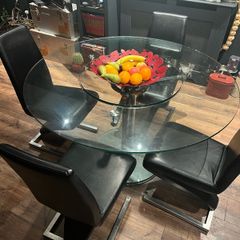 Glass dining table with rotator and 4 leather chairs