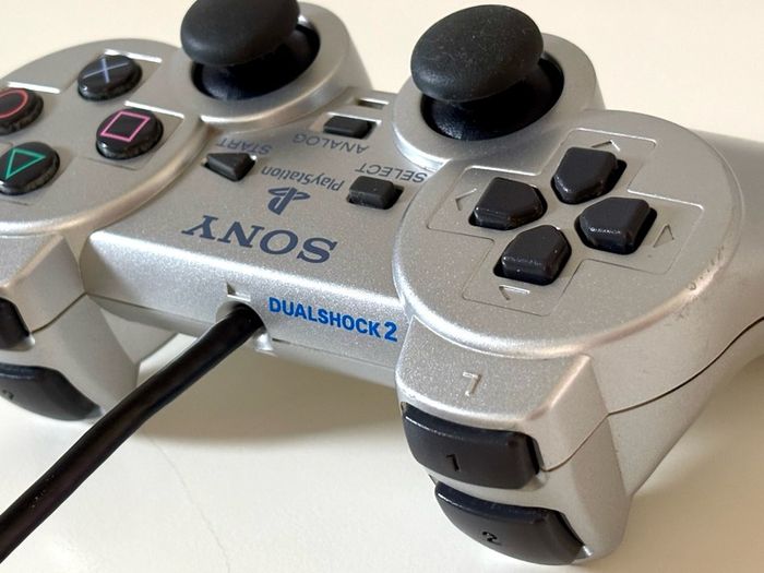 Original Sony PlayStation 2 Slimline Console in Satin Silver Boxed and Beautiful