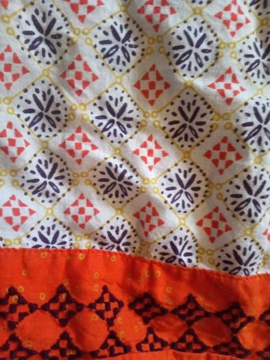 DP...am beautiful orange top with pretty details