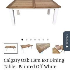 Solid oak 1.4m extending to 1.8m dining table