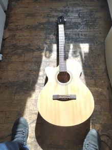 Left handed woodstock electro acoustic