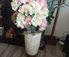 flowers in tall vase