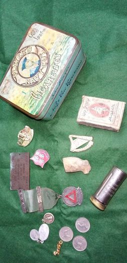 old tin and contents