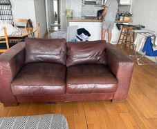 Brown Leather Couch and Footstool