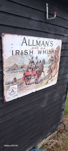 large  allmans  whiskey  metal  sign