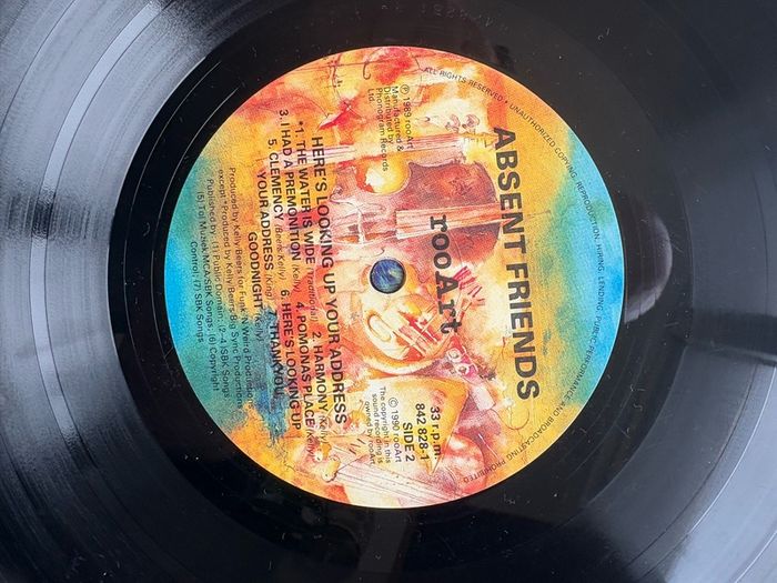 Absent Friends - Here's Looking Up Your Address. Excellent condition with inner sleeve. Successful 1990 release by Australian band - this was certified Gold, had four singles released, and made No. 7 on the Australian album charts.