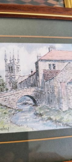 2 framed art work- 1- Vermeer's The Glass of Wine Fine Art Print -  Classic Wall Decor . 25.00euro.2- Helmsley Yorksire Colin Williamson Watercolour 35.00 euro.