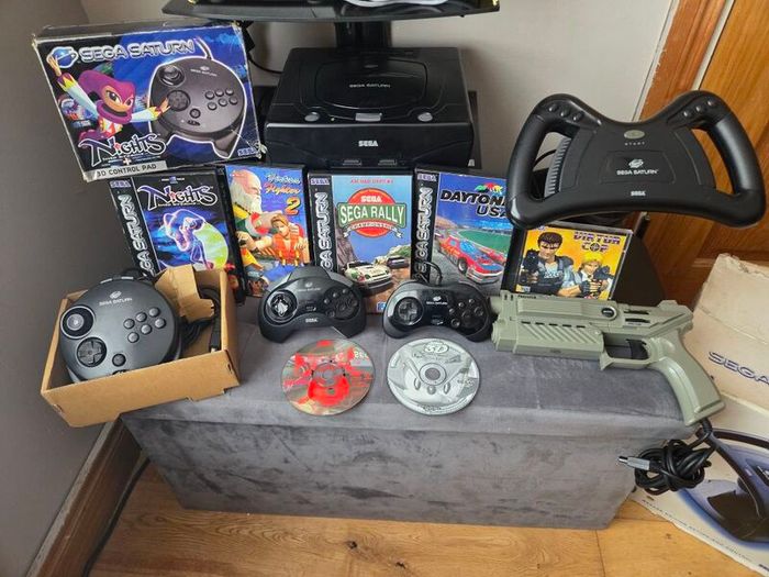 Sega Saturn w/ 3D Control Pad, Arcade Racer, Lightgun and Games