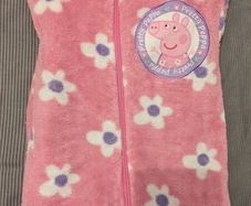Peppa Pig PJ's.  Aged 2-3years