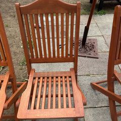 four foldable garden chairs and one table