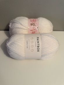 2 balls of white yarn wool