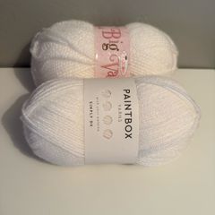 2 balls of white yarn wool