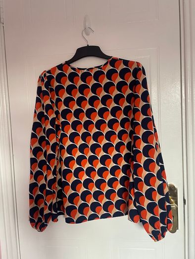 Orange and navy top