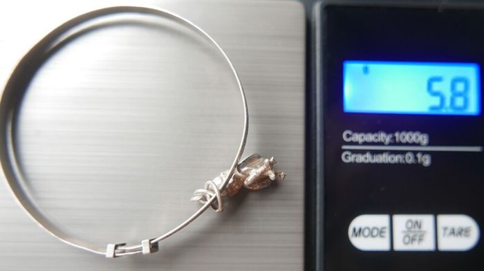 Vintage 925 Sterling Silver bangle with charm