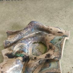 Ceramic ripple pod tea light candle holder by Amanda Murphy  made in Waterford Ireland. The ripple pod is individually hand made so no two pieces are ever the same