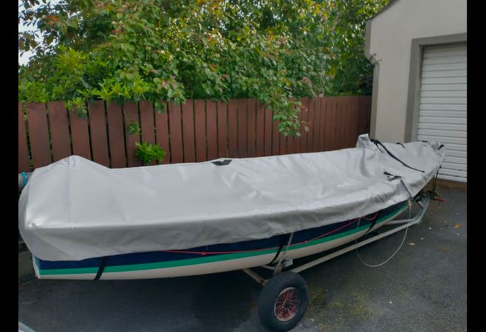 Laser 13 sailboat with road and launching trailer