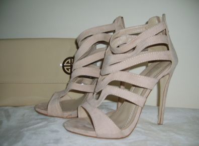 Nice shoes and a handbag .
