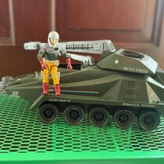 1987 G.I. Joe Persuader vehicle with its driver action figure, Backstop, made by Hasbro as part of the A Real American Hero series