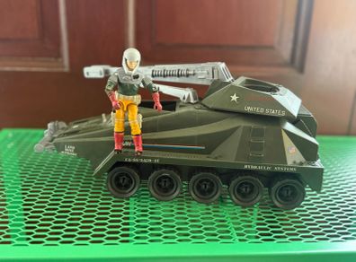 1987 G.I. Joe Persuader vehicle with its driver action figure, Backstop, made by Hasbro as part of the A Real American Hero series