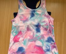 BNWT girls sports top (10-11 years)