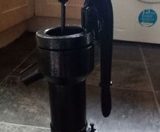 old antique cast iron water pump