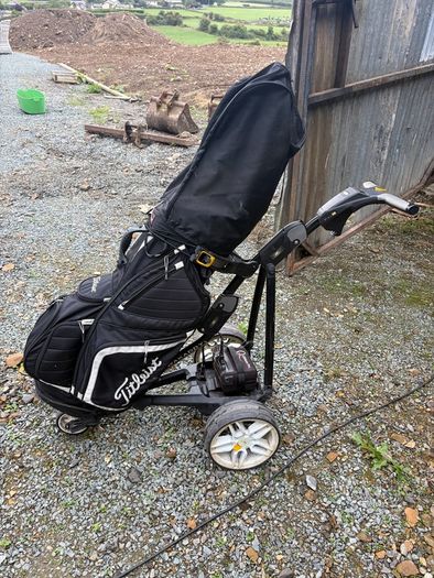 Powacaddy electric trolley with titleist golf bag