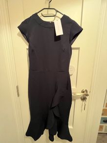 Brand new Paper Dolls dress size 8