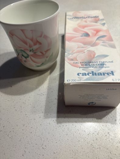 - Cacharel Anais Anais Royal Doulton 9 cm high vase / tumbler / container and Free ( almost full ) perfumed body shampoo ( 200 ml )